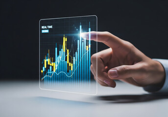 Hand interacting with futuristic financial data visualization on transparent screen
