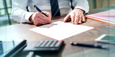 Businessman signing a document, geometric pattern