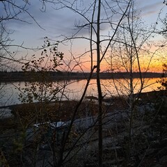 Obraz premium sunset on the river