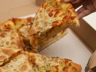 Cheese Pizza, whole and sliced, on white background