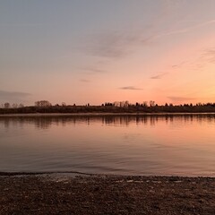 Naklejka premium sunset over the river