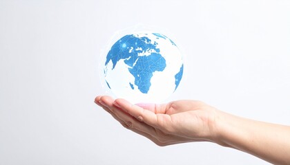 A hand cradling a luminous globe, representing global connectivity and environmental consciousness