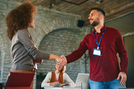 Professional Team Shake Hands in Office Setting for Collaboration and Meeting
