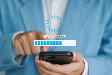 Software update and operating system upgrade concept with businessman using smartphone and virtual update bar, symbolizing enhanced functionality, new features, and improved device performance