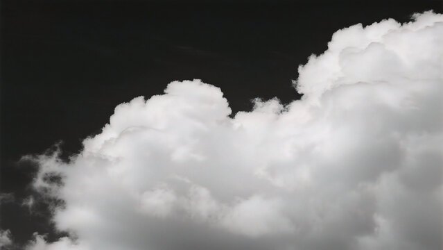 White clouds against dark sky