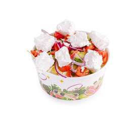 Fresh salad bowl with vegetables and creamy topping served in a colorful dish