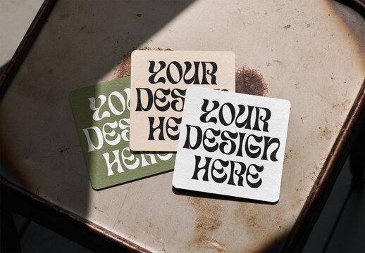 Mockup Of Three Customizable Square Drinks Coasters