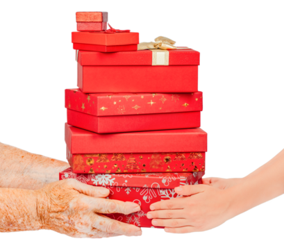 Elderly and young hands holding a stack of red gift boxes decorated for Christmas, isolated on white. Generational giving and holiday sharing concept symbolizing care, family celebration.
