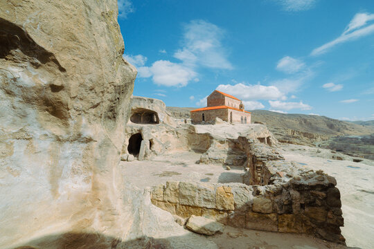 Uplistsuli Church of the Prince in Uplistsikhe, an ancient rock-hewn town near Gori, Shida Kartli, Georgia. High-quality photo capturing historic architecture and stone structures.