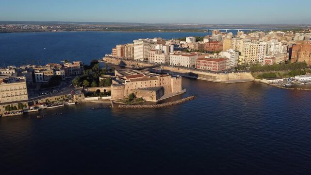 Taranto City at Mediterranean Sea Aerial View at Sunset
