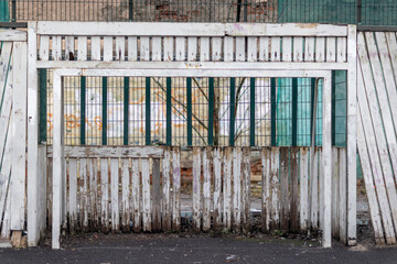 A close-up of a football goal in a city park
