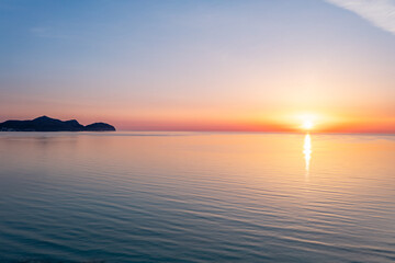 Naklejka premium sunset over the sea