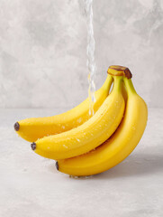 Fresh Bananas with Water Splash on Light Background for Healthy Lifestyle Concepts