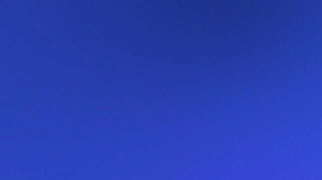 Gradient of blue with subtle light variation creating a smooth and even background visual effect
