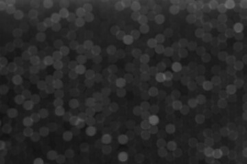 Bokeh effect of a board with metal pins known as pinpression. Blurry effect