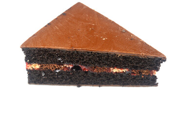 a slice of a chocolate cake, made with chocolate or cocoa and can be flavored with fudge or vanilla cream, a cake with multiple layers with a filling and topped with chocolate ganache