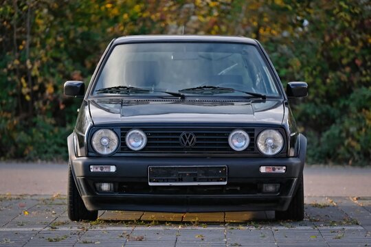Neu-Ulm, Germany - October, 26, 2025: VW Golf Mk2 GTI parking on the backyard. Front view.