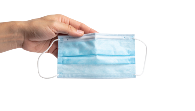 A hand gently presenting a blue surgical mask, highlighting health and protection measures. The mask is held in a clear and minimalist presentation