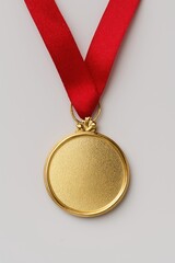 Celebrate achievements with this stunning gold medal on vibrant red ribbon, perfect for recognition, awards ceremonies, and promoting a winning attitude