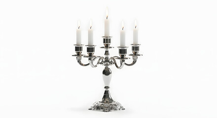Antique silver candlestick holder with burning candles and flame for a holiday or vintage celebration