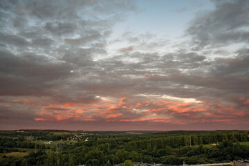 Epic red sunset over countryside