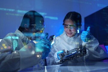 Engineers work in semiconductor or microchip labs in the electronics industry. Electronic engineers...