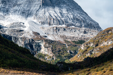 Autumn scenery of snow-capped mountains and valleys on the Qinghai-Tibet Plateau, Daocheng Yading Scenic Area in Sichuan, China