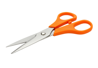 Isolated pair of orange handled scissors lying on side for use in crafting, office, or art