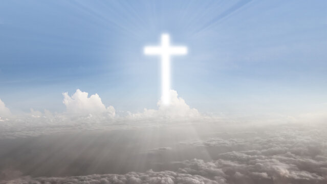 Christian cross of cloud shape with clear sky background. Concept of Christianity, religious, faith, Jesus, or belief