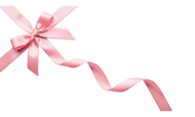 Pink silk ribbon tied into a bow with flowing streamers isolated against transparent
