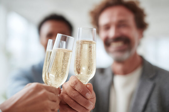 Diverse group toasting with sparkling wine. Symbolizes achievement, celebration, success, and teamwork. Perfect for corporate events, new beginnings, or festive occasions. - Powered by Adobe