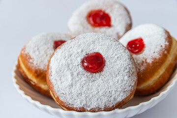Tasty donuts with jam - Hanukkah celebration concept