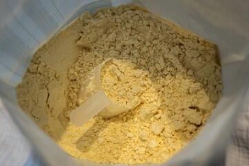 White bag with meal replacement powder containing a large portion of  protein and fiber to lose weight.