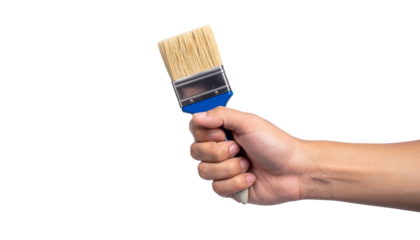 A person holding a paintbrush, ready for painting