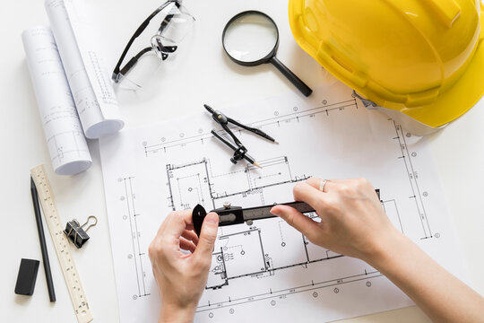 architect working on blueprints