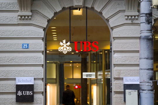 Close-up of entrance of UBS bank building with logo at famous Bahnhofstrasse on a rainy autumn day. Photo taken October 27th, 2025, Zurich, Switzerland.