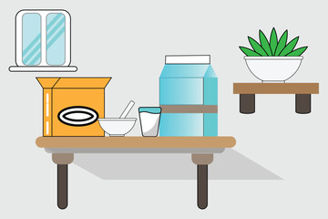 Baking ingredients and a plant on a table near a window, creating a cozy and inviting atmosphere in the kitchen