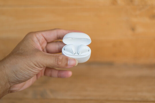 Nakhonpathom,Thailand - 30 Aug, 2025: wireless earbuds Remax model W26 for smartphone 