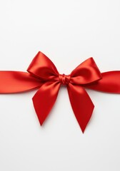 Fototapeta premium A luxurious satin red bow prominently tied, centered on a pristine white backdrop, suitable for Christmas, Valentine, or anniversary wrapping ,gift ,vibrant ,background