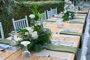 wedding reception dinner table suit at the garden in sunshine before event start