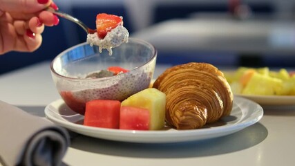 Chia pudding croissant Bowl fruit pastry Bowl Of Fresh Blueberries And Strawberries. - Powered by Adobe