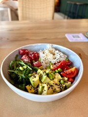Colorful Poke Bowl with Tuna, Avocado, and Rice