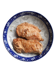 Grilled chicken meat in a food plate, isolated on a PNG background.