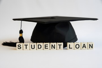 Graduation cap with student loan message for financial planning and education savings concepts