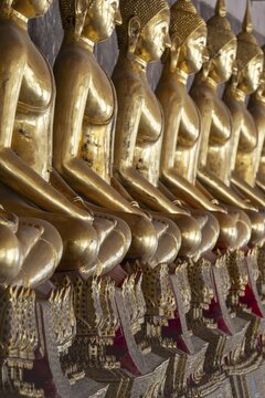 Gilded Buddha statues (Bhumispara mudra: Buddha Gautama at the moment of enlightenment), Wat Suthat Thepwararam, Royal Temple, Phra Nakhon, Bangkok, Thailand