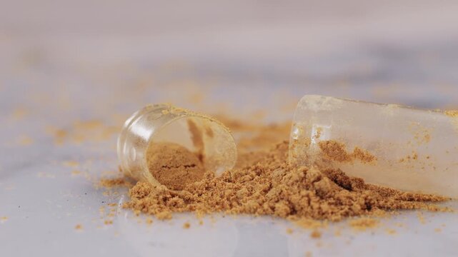 Ashwagandha Indian Ginseng Powder in White Bowl isolated on white background, superfood close up. 
