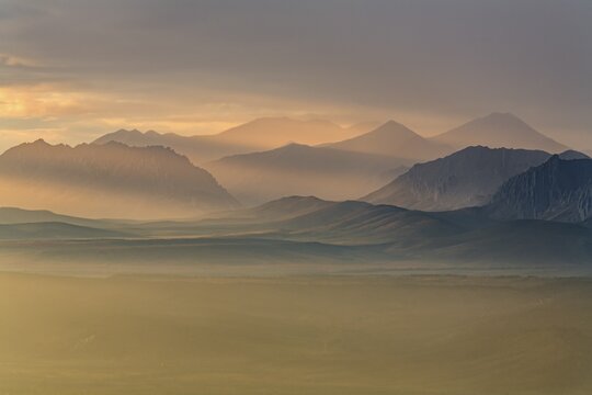 Morning light, clouds, fog, autumn, haze, autumn colours, wilderness, mountain landscape, Ogilvie Mountains, Dempster Highway, Yukon, Canada