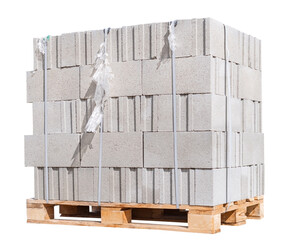 The pallet with a stack of concrete curbstone on white