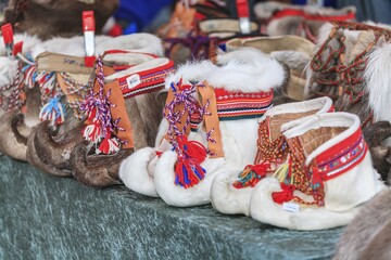 Traditional shoes made of fur, reindeer fur, Sami culture, Jokkmokk winter market, Jokkmokk, Lapland, Sweden