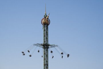 Star Flyer chain carousel at a height of 80 metres, Tivoli Amusement and Recreation Park, Copenhagen, Denmark